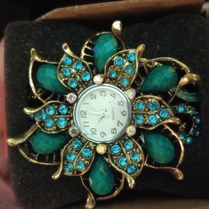 Bejeweled flower watch